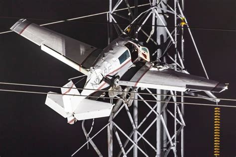 Pilot safely removed from plane that crashed into power lines in .